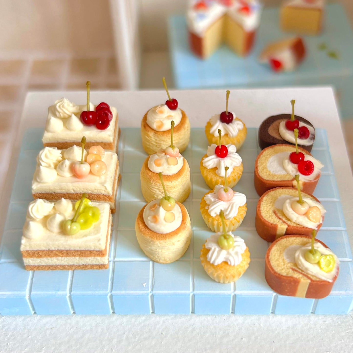 miniature dessert display featuring handmade cherry cupcakes