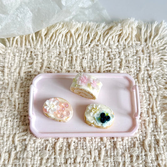 miniature flower Swiss roll and floral baguette dessert designs