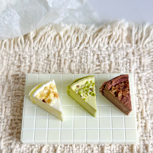 miniature decorated mille crepe cake with layered crepe texture