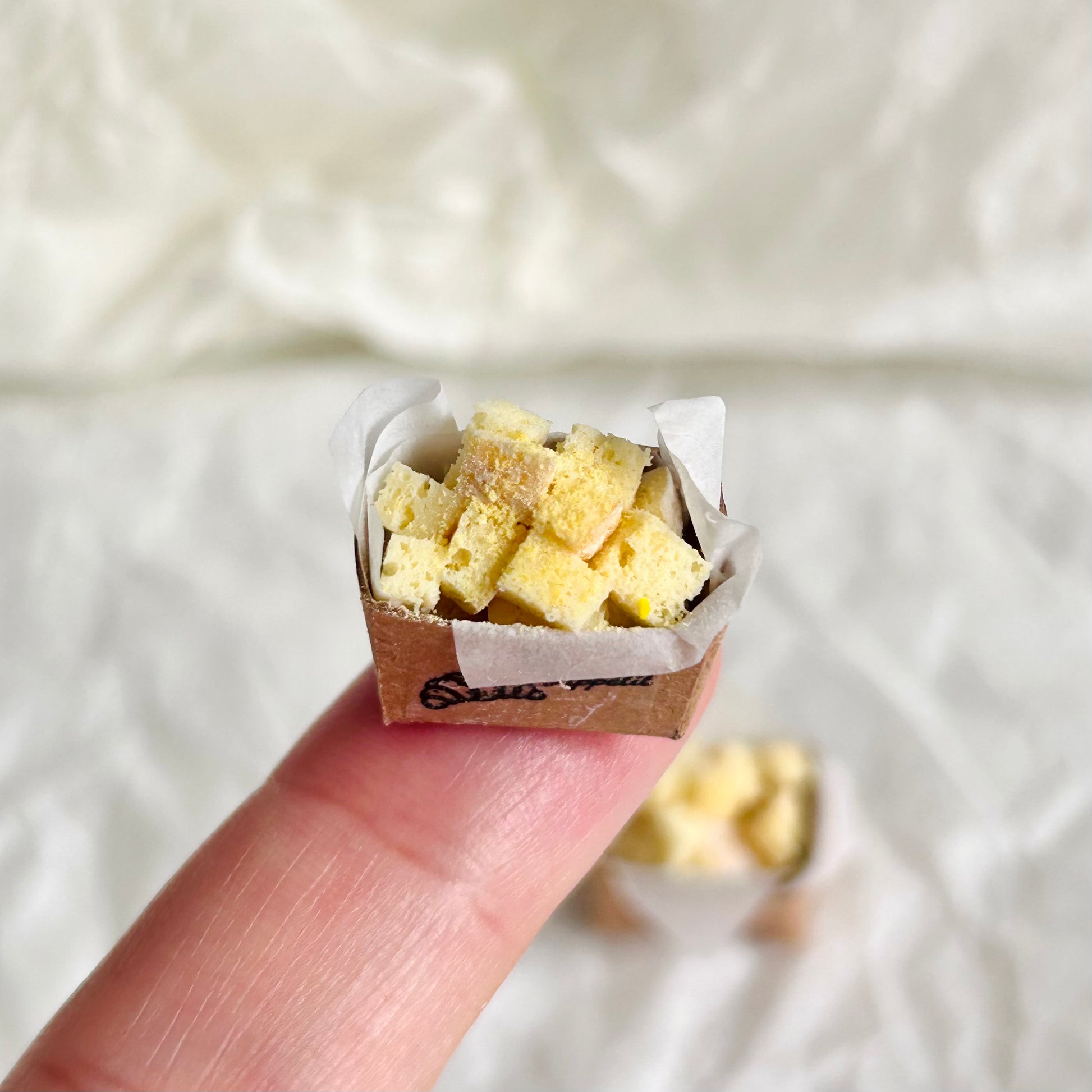 miniature baguette pieces topped with cheese powder