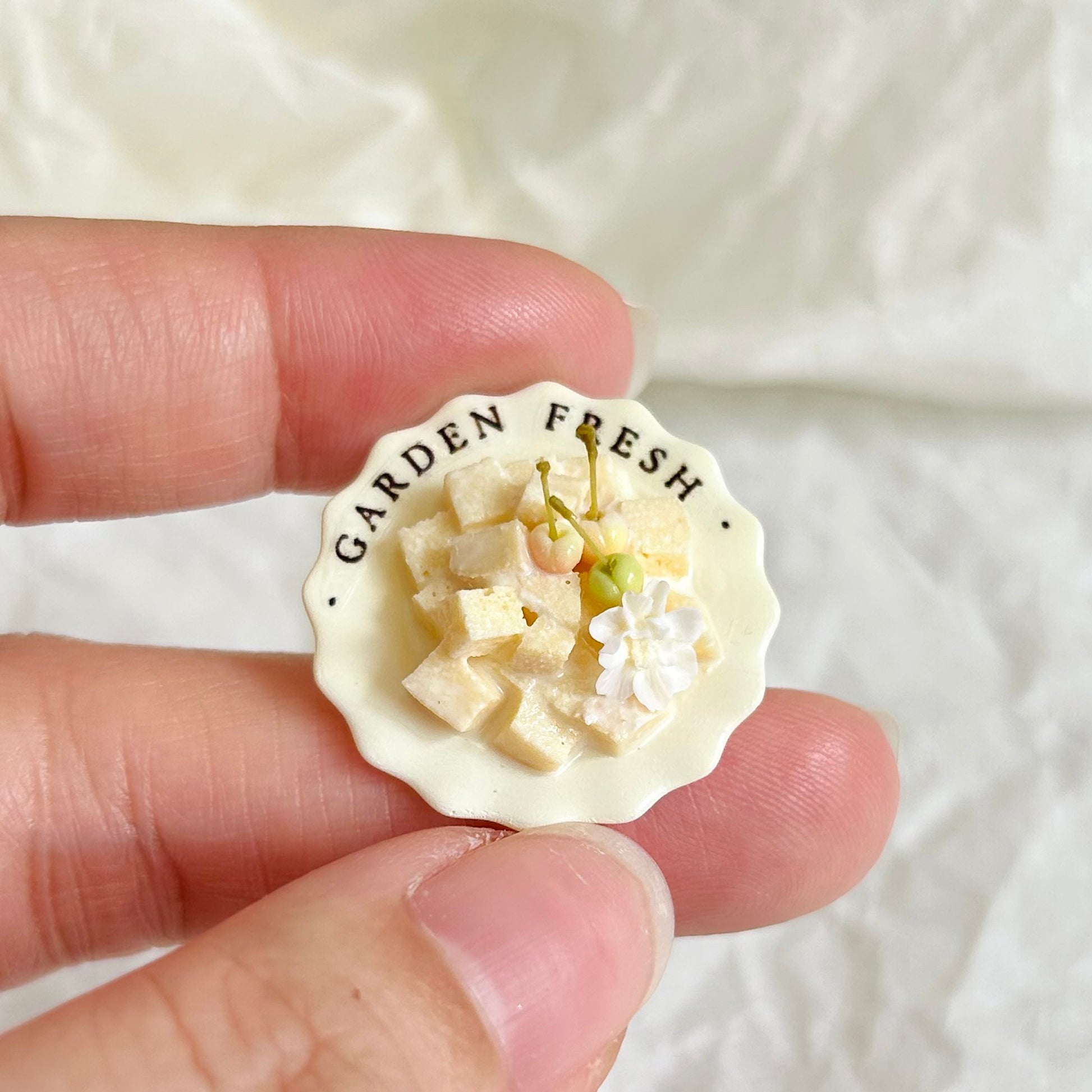 collectible handmade miniature dessert with bread cubes