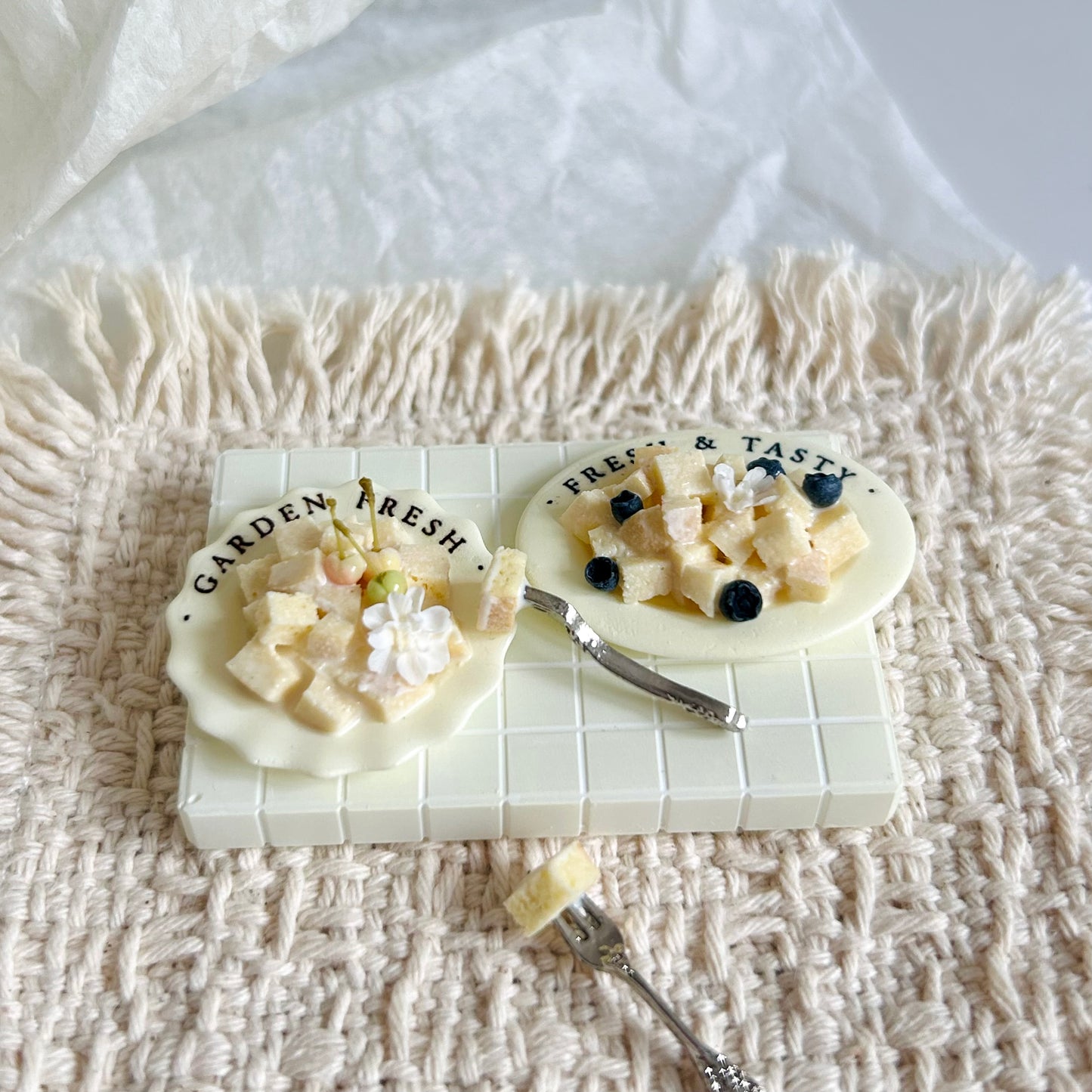 realistic miniature condensed milk bread cubes with fruit toppings