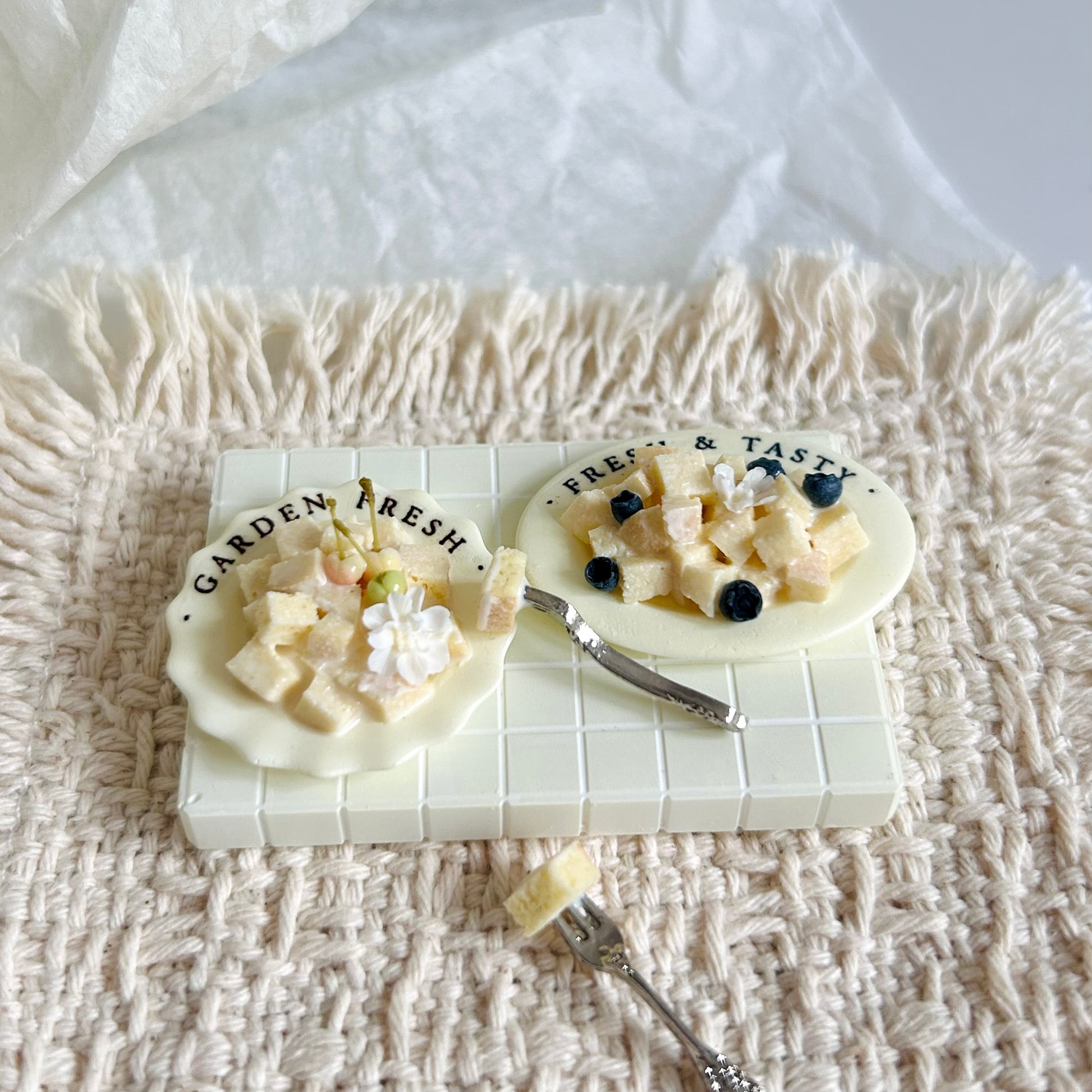 realistic miniature condensed milk bread cubes with fruit toppings
