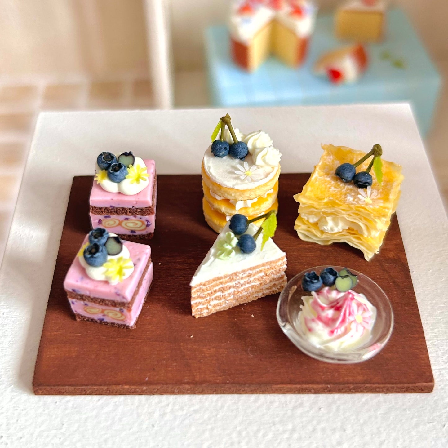miniature dessert display featuring handmade mille feuille pastry
