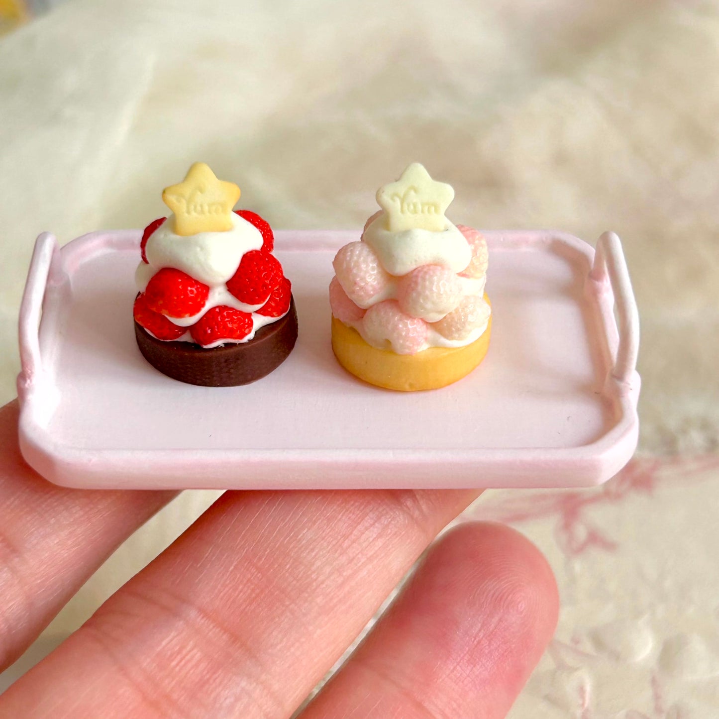 miniature strawberry tart collection with pink and red strawberry flavors
