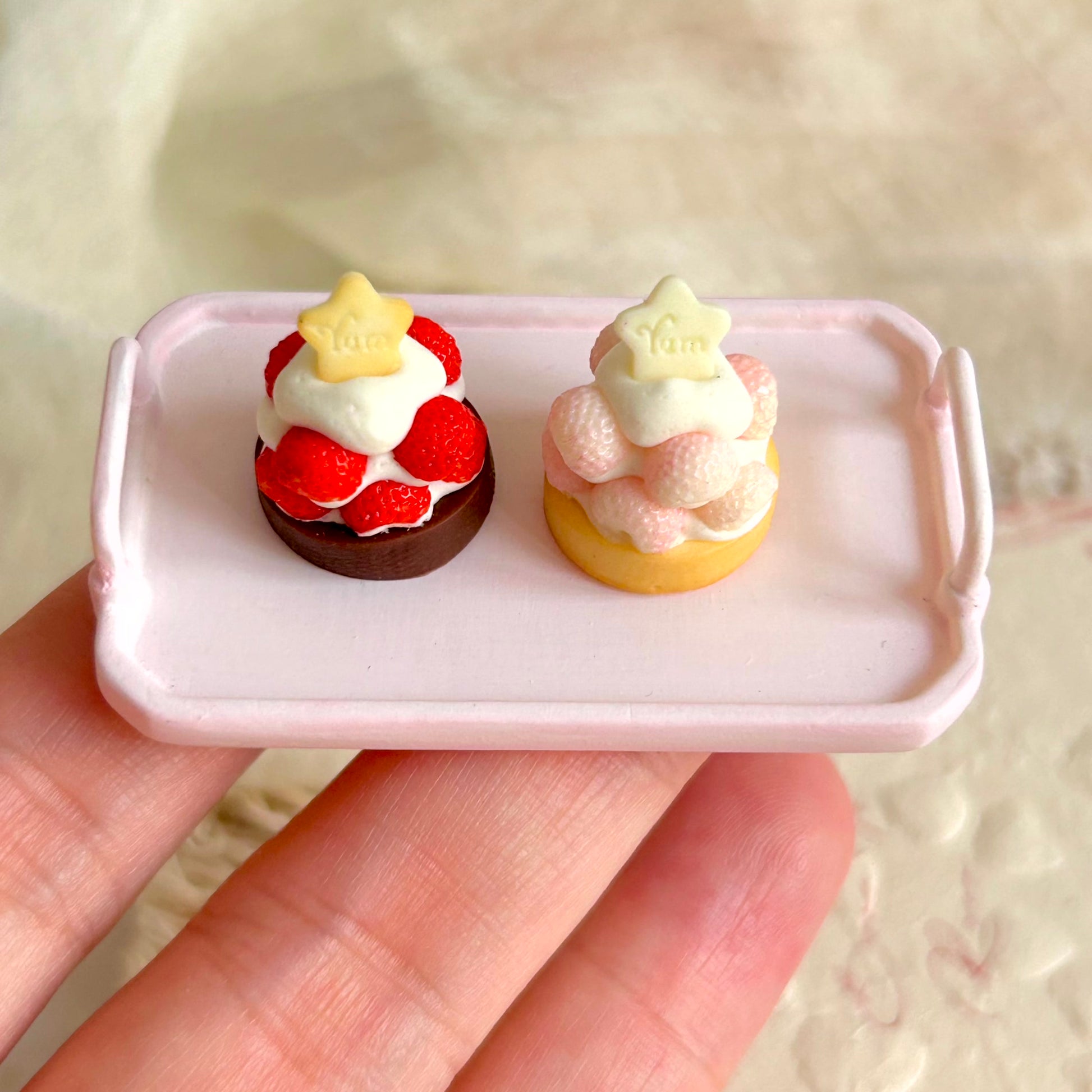 handcrafted miniature dessert tart with realistic strawberry details