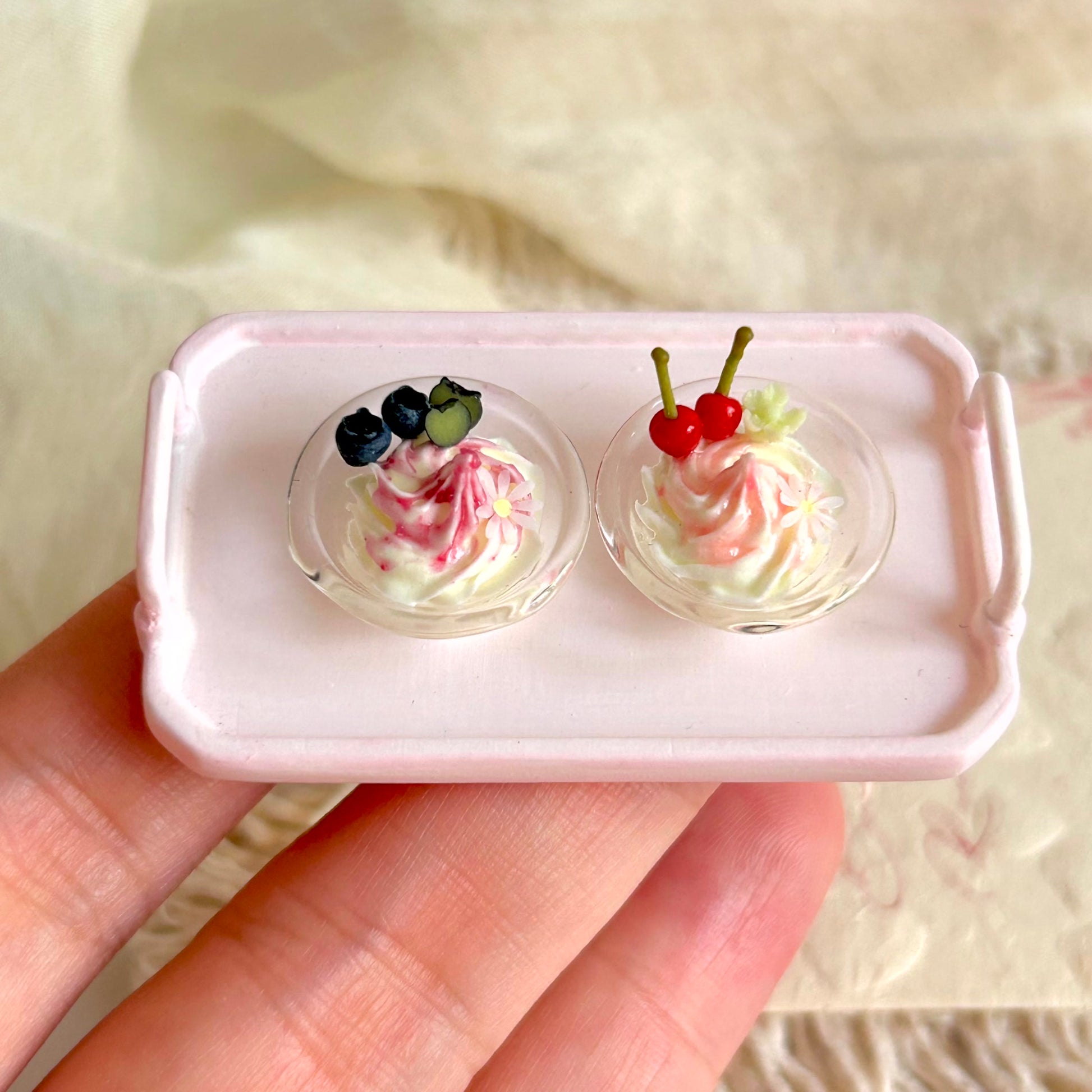 small scale miniature glass dessert bowl held in hand