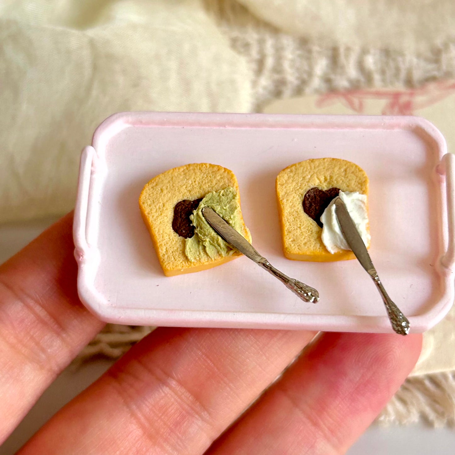 realistic miniature pound cake slice with cream spreading detail
