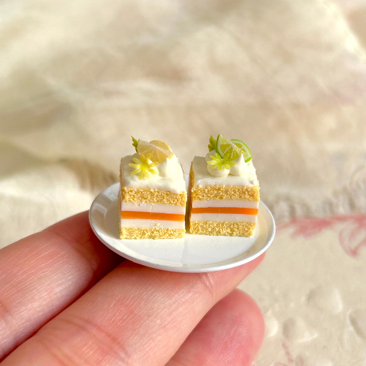 realistic miniature layered lemon cake with cream filling