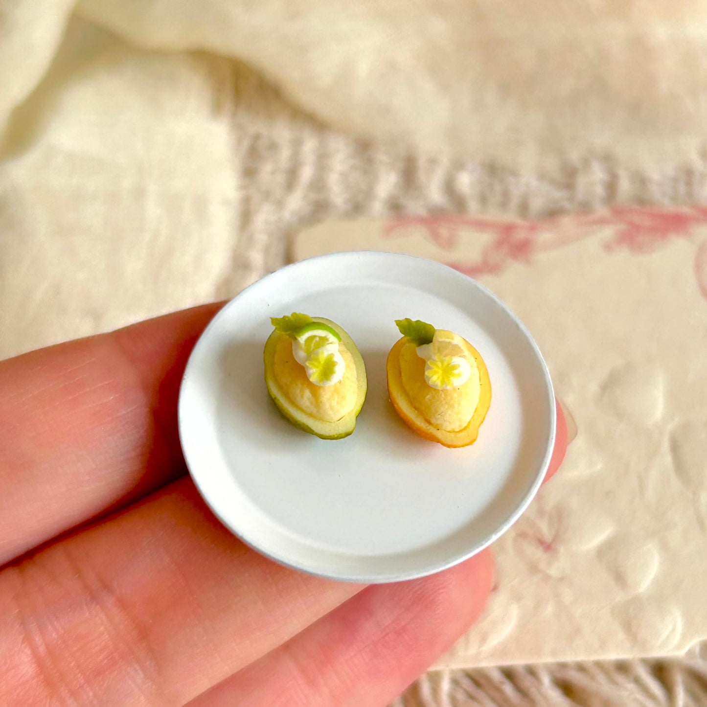 small handmade miniature citrus dessert held in hand