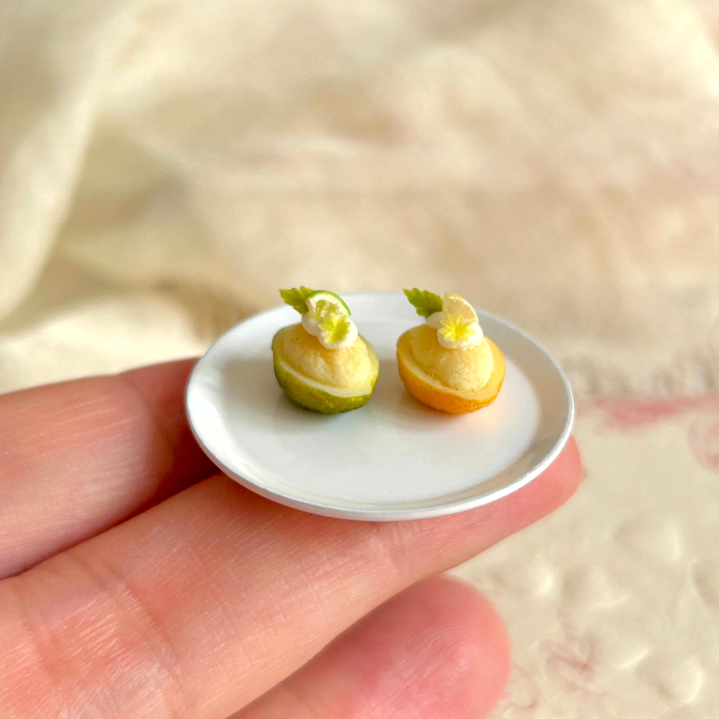 realistic miniature lemon boat cake with cream and polymer clay fruit details