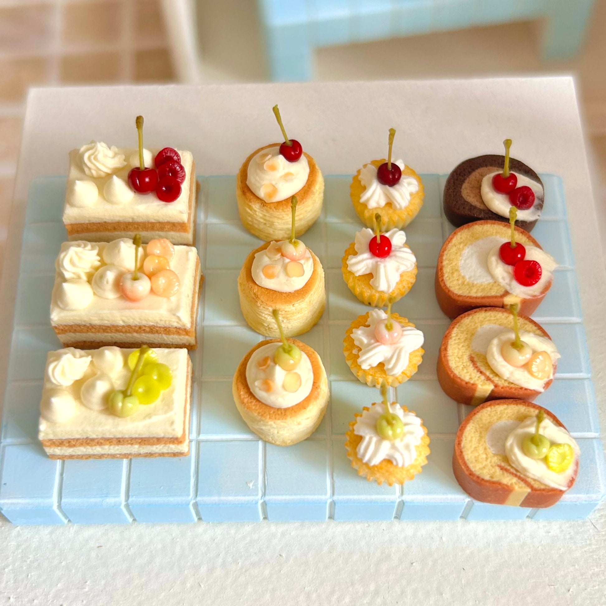 miniature dessert display featuring handmade cherry pastry
