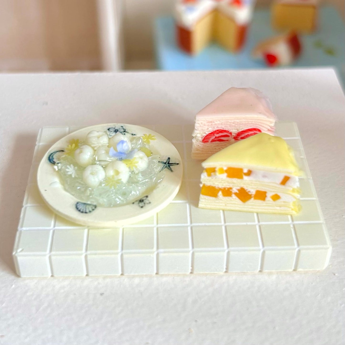 small handmade miniature lychee dessert plate held in hand
