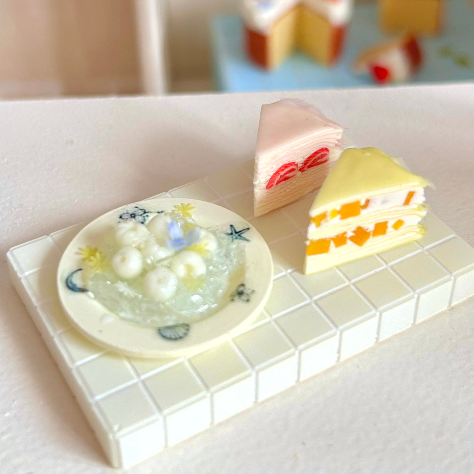 miniature summer dessert scene with ice lychee and flowers