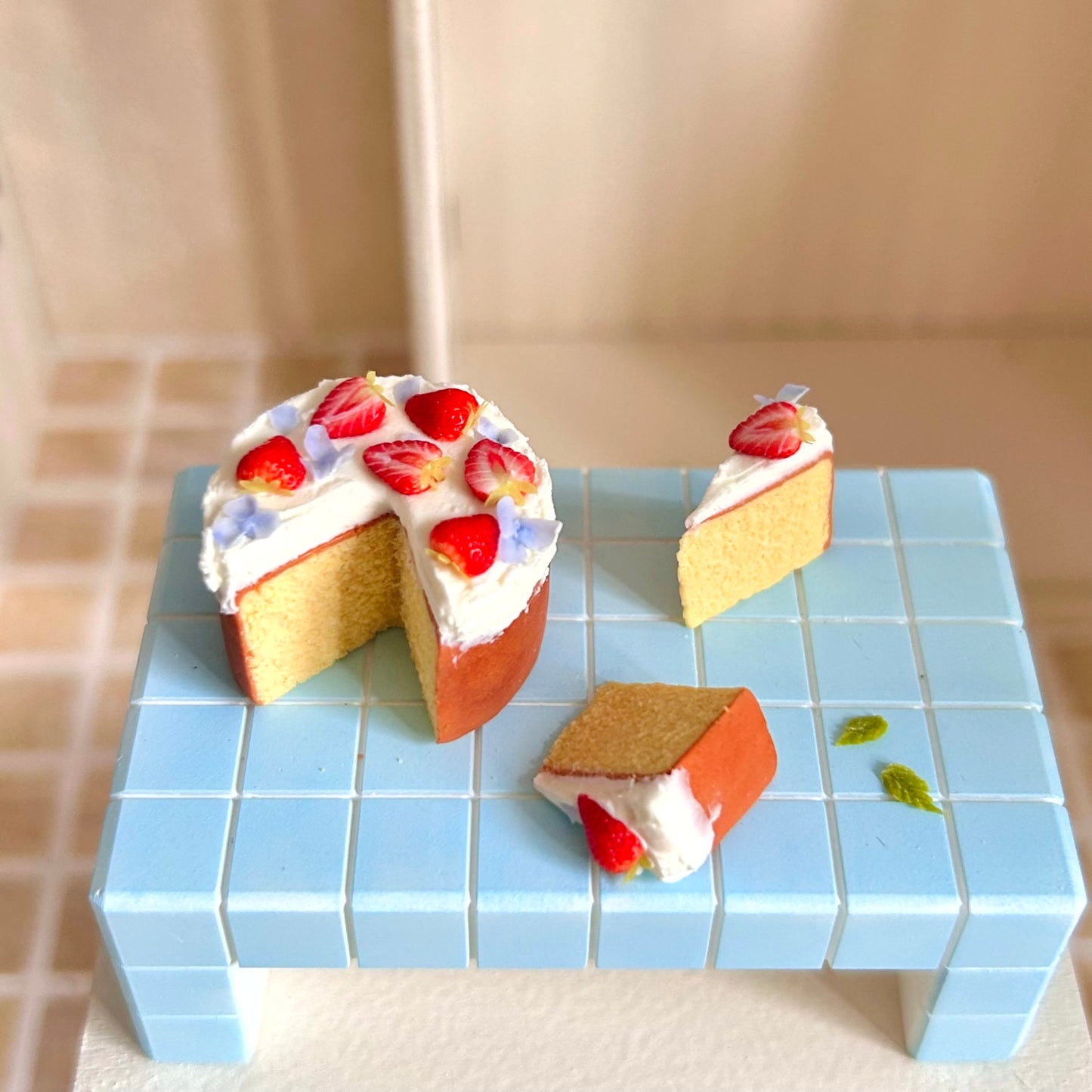 handmade miniature strawberry chiffon cake set with cream and flower decoration