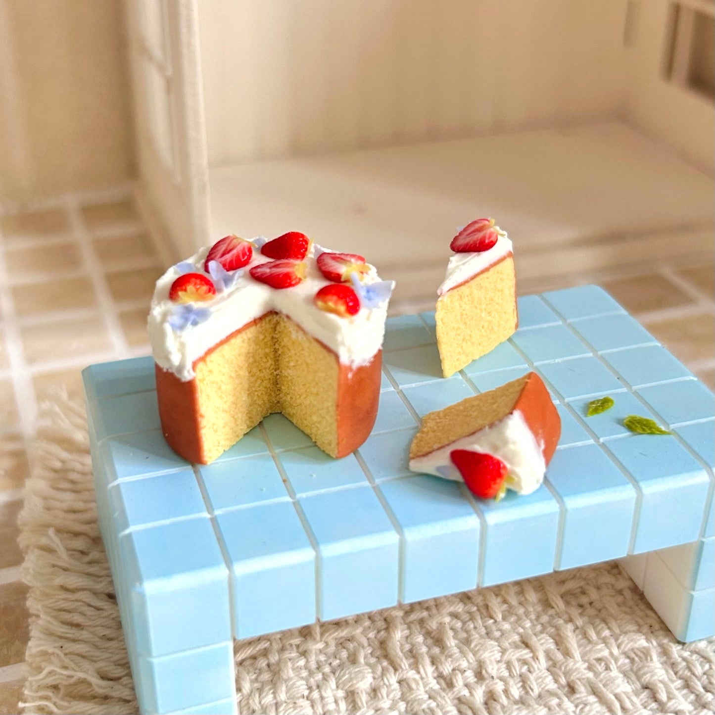 handmade miniature strawberry cream cake scene from different angle