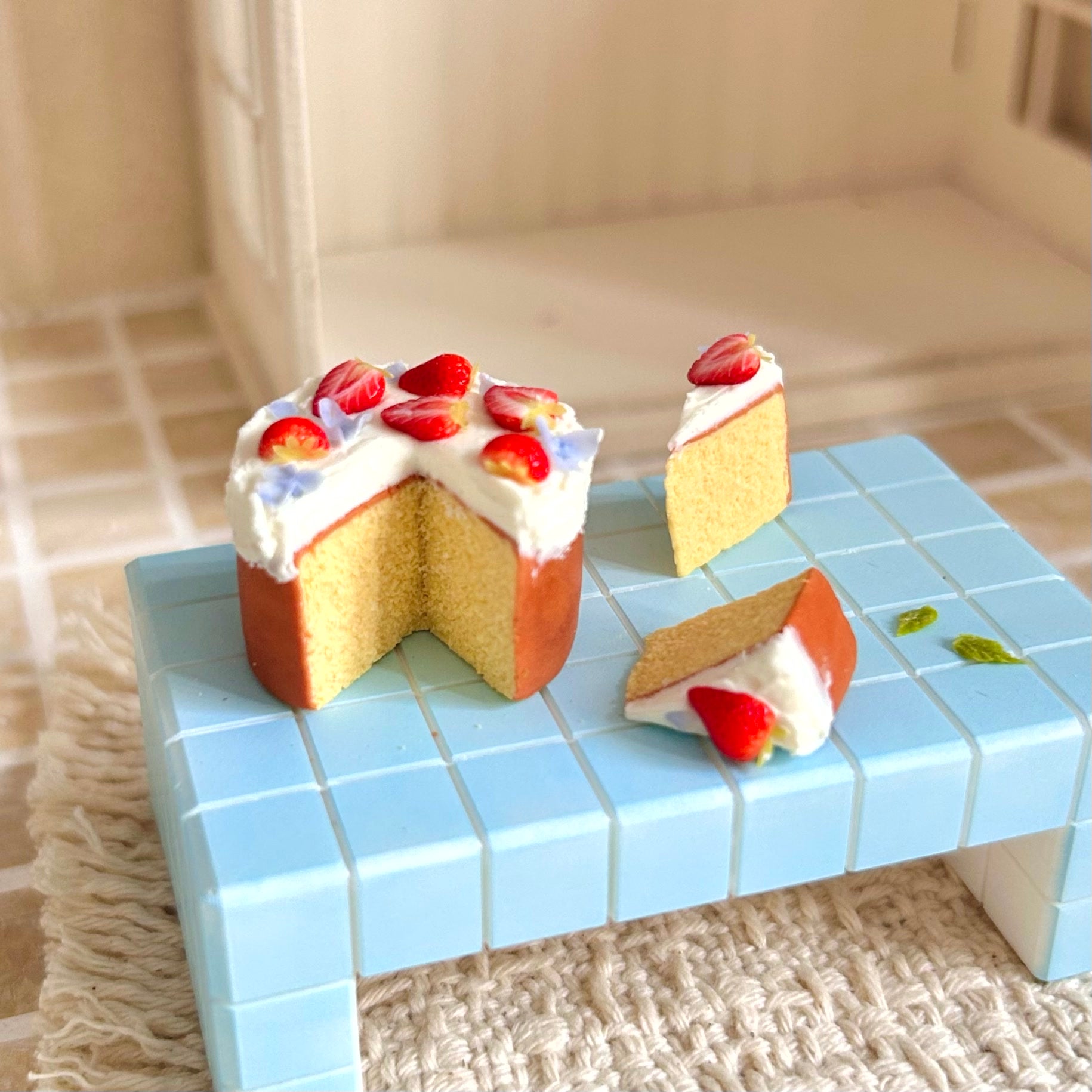 handmade miniature strawberry cream cake scene from different angle