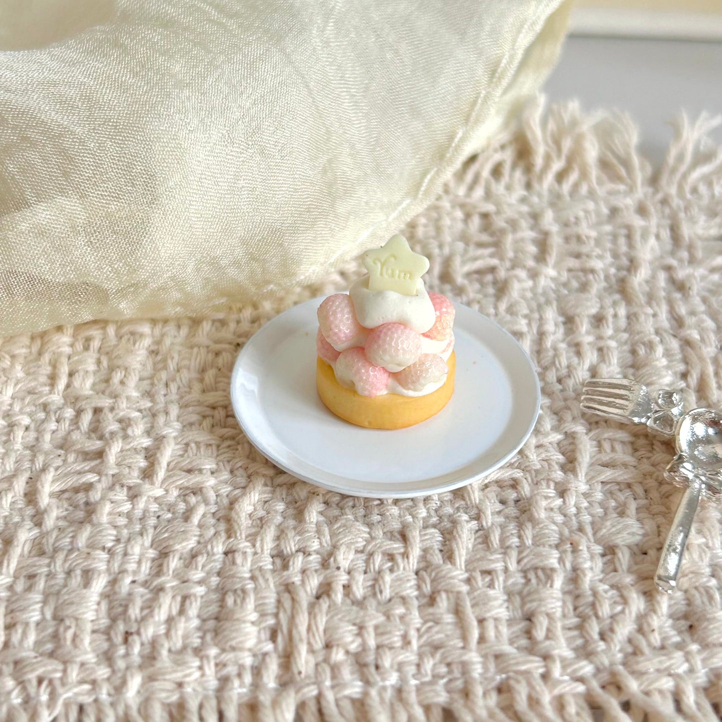 miniature pink strawberry tart handmade dessert with cream decoration