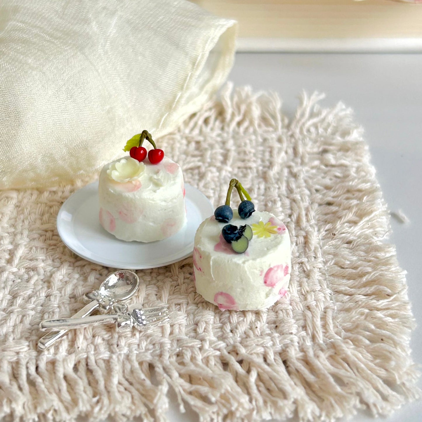 handmade miniature cherry and blueberry cream cake realistic dessert