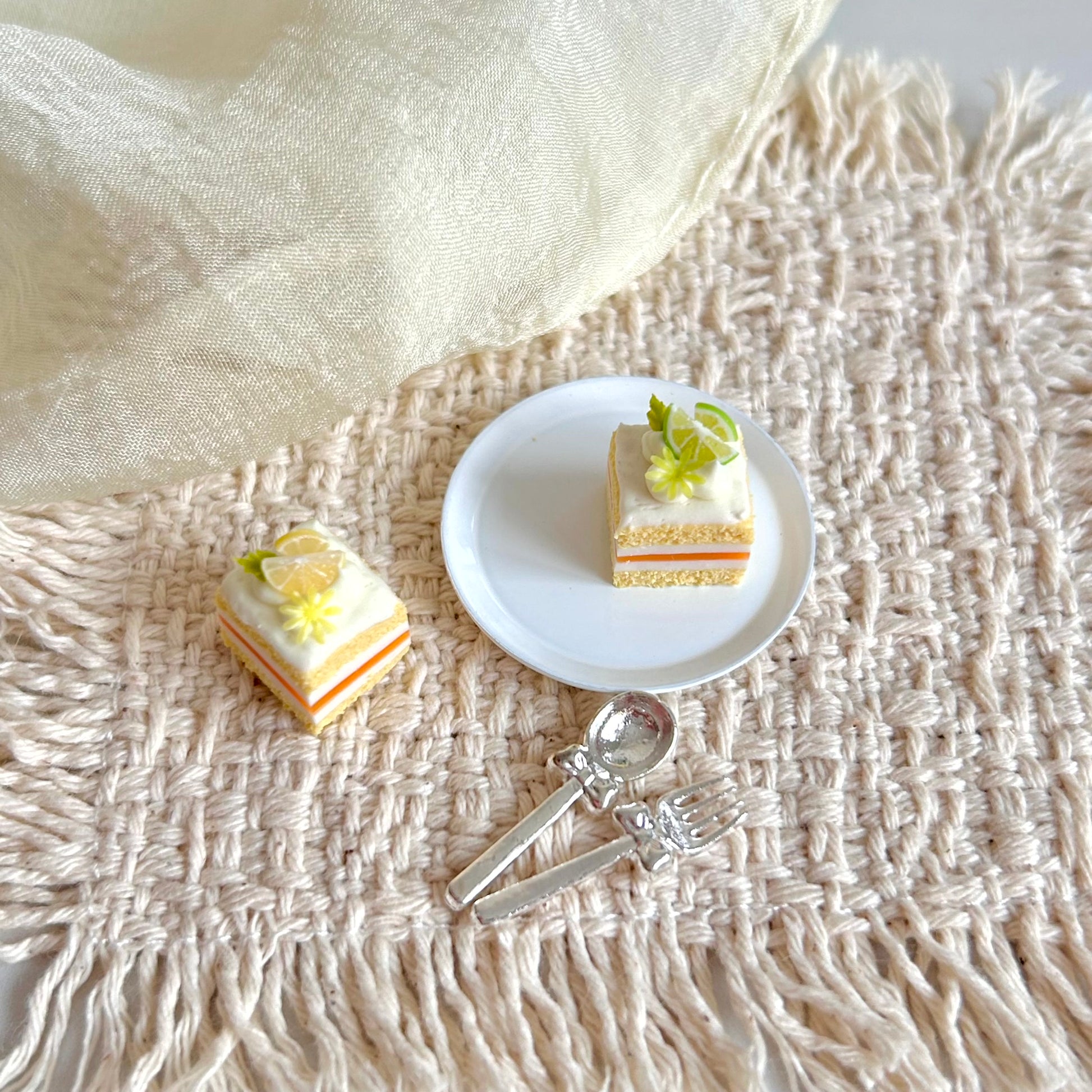 handmade miniature lemon and lime cake slice realistic dessert
