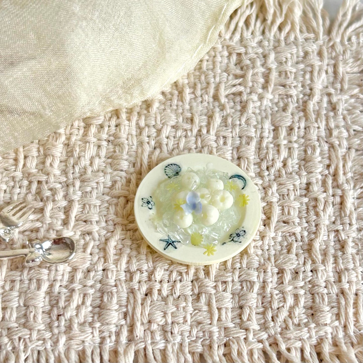 miniature lychee dessert scene with hand-painted miniature plate