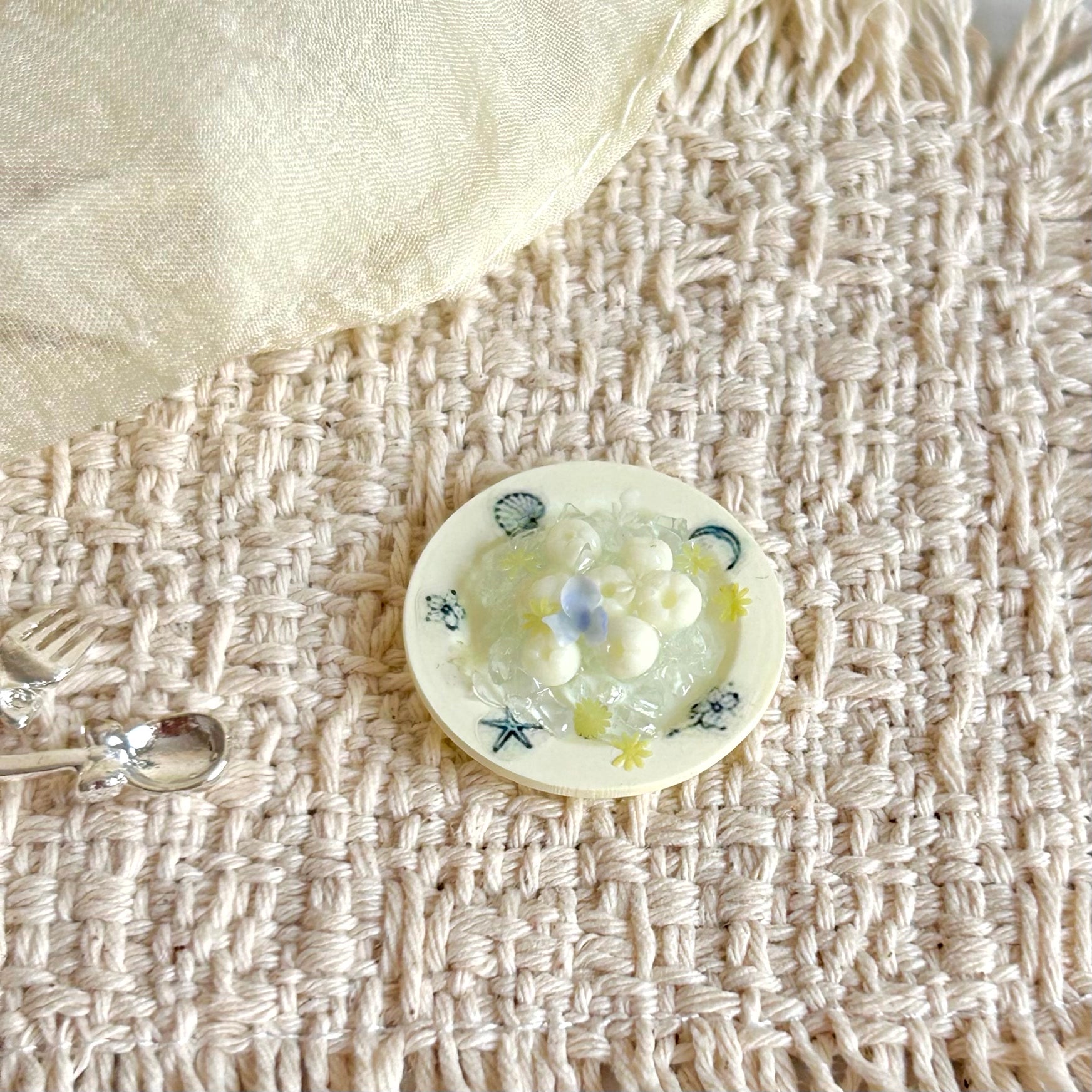 miniature lychee dessert scene with hand-painted miniature plate