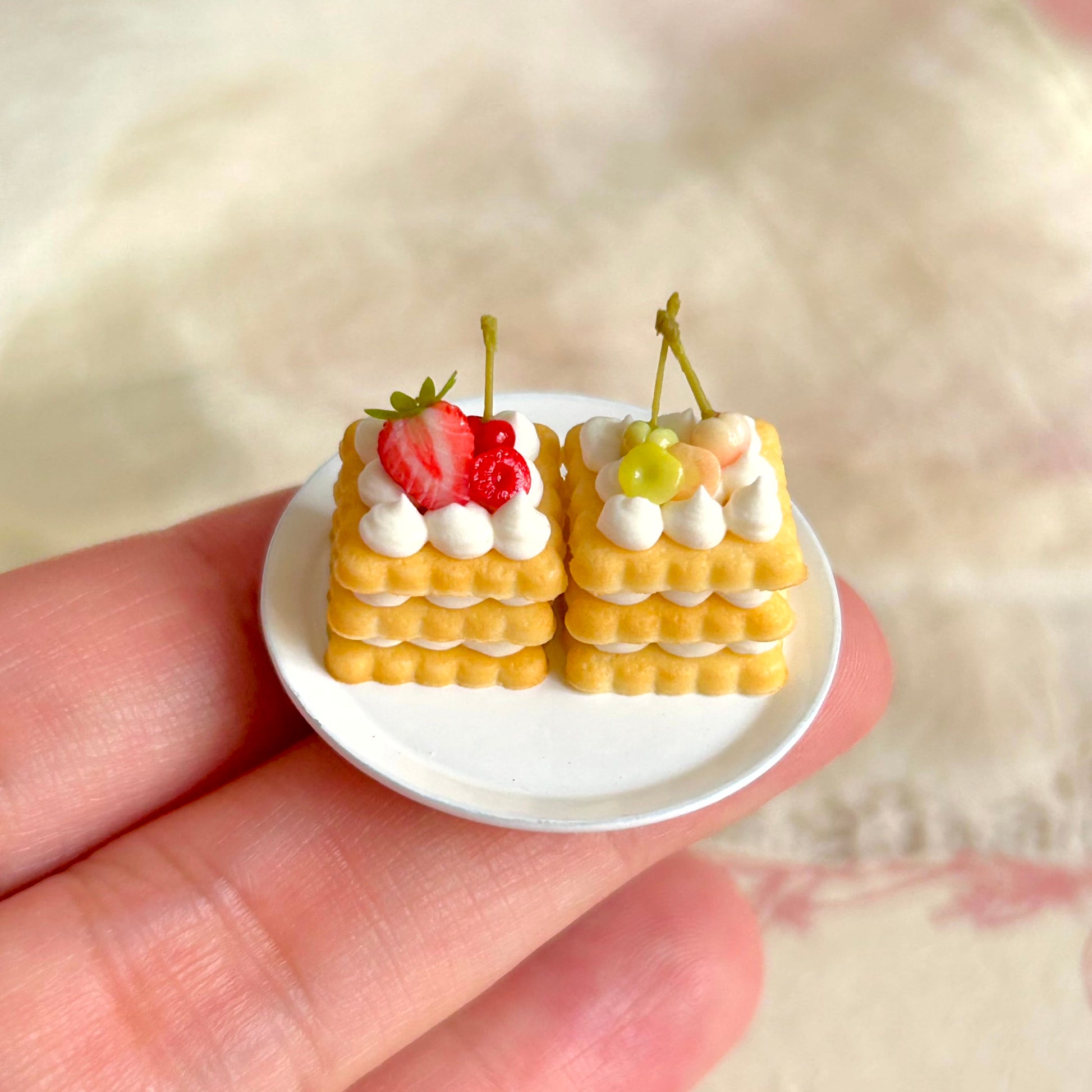 small scale handmade miniature cookie dessert held in hand

